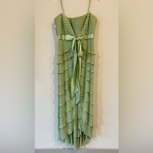 Tadashi Shoji pistachio green tiered dress with slit in the front